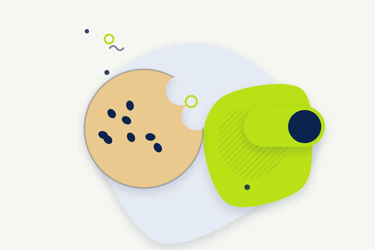 Ilustración de papel: una galleta junto a un interruptor